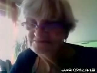 55 years old granny films her big tits on cam vid